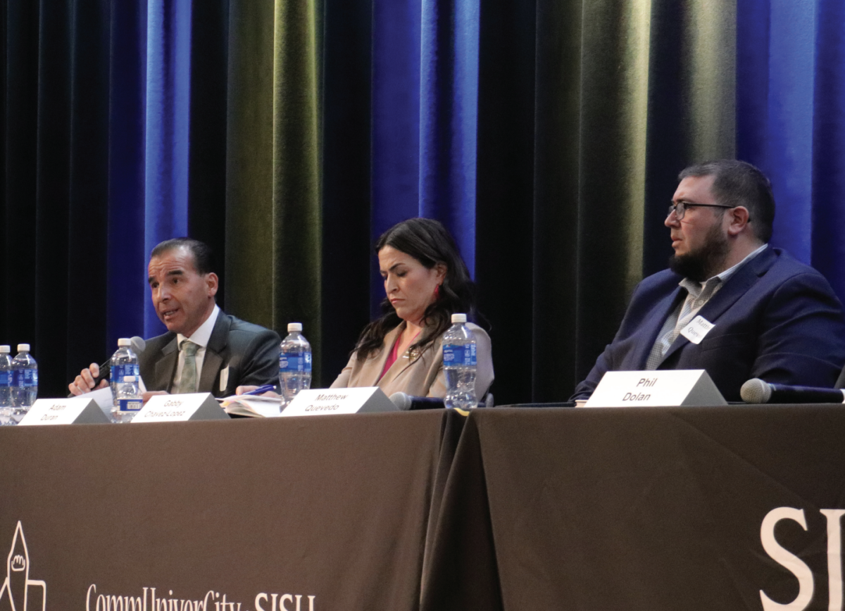 City council candidates for District 3 attend a forum and address community questions and discuss policies at the Student Union Theatre on Wednesday night.